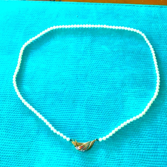 Beautiful Pearl necklace with 14K gold clap.